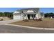 Charming single-Gathering home with attached two-car garage and well-manicured lawn at 231 Broughton Dr., Myrtle Beach, SC 29579