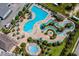 An aerial view showing a multi-pool area with various amenities like a lazy river, kiddie pool and lounge chairs at 2790 Howard Ave. # D, Myrtle Beach, SC 29577