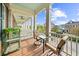 Relaxing balcony with comfortable chairs, a table, and views of the surrounding neighborhood at 2790 Howard Ave. # D, Myrtle Beach, SC 29577