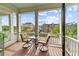 Charming balcony featuring seating and scenic views of the neighborhood at 2790 Howard Ave. # D, Myrtle Beach, SC 29577