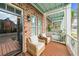 Relaxing covered balcony featuring comfortable seating, providing a serene outdoor living space at 2790 Howard Ave. # D, Myrtle Beach, SC 29577
