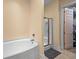 This bathroom features a tub and a walk in shower at 2790 Howard Ave. # D, Myrtle Beach, SC 29577