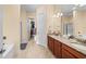 This bathroom features a double vanity and a walk in shower at 2790 Howard Ave. # D, Myrtle Beach, SC 29577