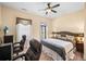 Comfortable bedroom with a ceiling fan, a private balcony and a cozy retreat at 2790 Howard Ave. # D, Myrtle Beach, SC 29577