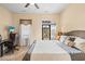 This bedroom features an access door to a balcony and neutral walls at 2790 Howard Ave. # D, Myrtle Beach, SC 29577