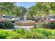 Community fountain surrounded by manicured gardens and walking paths in a serene, pedestrian-friendly setting at 2790 Howard Ave. # D, Myrtle Beach, SC 29577