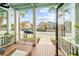 Inviting front porch with views of the neighborhood at 2790 Howard Ave. # D, Myrtle Beach, SC 29577