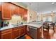 Functional kitchen area with granite countertops, stainless steel dishwasher, and ample cabinet storage at 2790 Howard Ave. # D, Myrtle Beach, SC 29577