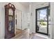 Bright foyer with hardwood floors and view to additional rooms at 2904 Lunar Ct., Myrtle Beach, SC 29577