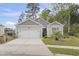 Charming single-story home with well-manicured lawn and attached garage at 2904 Lunar Ct., Myrtle Beach, SC 29577