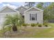 Close up of the house's palm tree and manicured lawn at 2904 Lunar Ct., Myrtle Beach, SC 29577