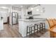 Kitchen featuring white cabinets, granite countertops, stainless steel appliances and bar stool seating at 2904 Lunar Ct., Myrtle Beach, SC 29577