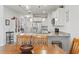 Open kitchen featuring stainless steel appliances, white cabinets and granite countertops at 2904 Lunar Ct., Myrtle Beach, SC 29577