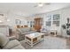 Spacious living room with ample seating, natural light, and an open layout to other living areas at 2904 Lunar Ct., Myrtle Beach, SC 29577