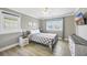 Cozy bedroom with a large window, side tables, and a comfortable bed for a peaceful night's sleep at 308 36Th Ave. N, North Myrtle Beach, SC 29582