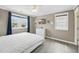 Relaxing bedroom featuring a comfortable bed, natural light from windows, and neutral tones for a serene ambiance at 308 36Th Ave. N, North Myrtle Beach, SC 29582