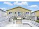 Exterior view of a raised beach house with stairs leading to a deck and covered ground level at 308 36Th Ave. N, North Myrtle Beach, SC 29582