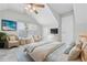 Bedroom with vaulted ceilings, natural light and comfortable seating area at 3255 Gervais Ln., Myrtle Beach, SC 29588