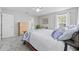 Comfortable bedroom with plush carpet, natural light, and an ensuite bathroom at 3255 Gervais Ln., Myrtle Beach, SC 29588