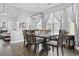 Dining room with large window, chandelier, and view to the living room at 3255 Gervais Ln., Myrtle Beach, SC 29588