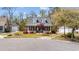 Charming home with black shutters, dormers, mature landscaping, and detached garage at 3255 Gervais Ln., Myrtle Beach, SC 29588