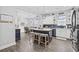 Kitchen with an island that has seating, open to dining room and living room at 3255 Gervais Ln., Myrtle Beach, SC 29588