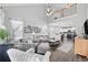 Open living room with tall ceiling, hardwood floors and view of open kitchen at 3255 Gervais Ln., Myrtle Beach, SC 29588
