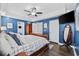 Stylish primary bedroom with tray ceiling, hardwood floors, and ensuite bathroom at 3255 Gervais Ln., Myrtle Beach, SC 29588
