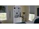 Bedroom featuring windows with natural light and moon phase tapestry at 3904 Birchwood St., North Myrtle Beach, SC 29582