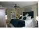 Stylish bedroom with a ceiling fan and decor at 3904 Birchwood St., North Myrtle Beach, SC 29582