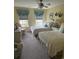 Bedroom with carpet, 2 twin beds, and windows allowing natural light at 3904 Birchwood St., North Myrtle Beach, SC 29582