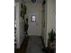 Welcoming hallway with neutral walls, a decorative rug and tasteful accents at 3904 Birchwood St., North Myrtle Beach, SC 29582
