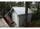 Storage shed with double doors and a chandelier adds a unique touch at 3904 Birchwood St., North Myrtle Beach, SC 29582