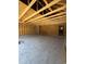Unfinished garage with concrete flooring and framing details at 4028 Copperhead Rd., Conway, SC 29527