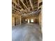 Unfinished interior showcases the home's framing, windows, and open layout at 4028 Copperhead Rd., Conway, SC 29527