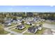 Spacious neighborhood view featuring well-manicured lawns, mature trees, and a community water tower at 441 Garden Ave., Georgetown, SC 29440