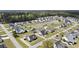 Residential area highlighting a tranquil pond and homes with private pools and manicured lawns at 441 Garden Ave., Georgetown, SC 29440