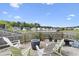 Serene backyard oasis with a scenic lake view and cozy patio seating area at 441 Garden Ave., Georgetown, SC 29440