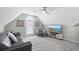 Cozy bonus room featuring modern decor, comfortable seating, and a large screen TV at 441 Garden Ave., Georgetown, SC 29440