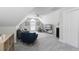 Bright bonus room includes comfortable seating and entertainment space at 441 Garden Ave., Georgetown, SC 29440