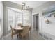 Sunlit breakfast nook with a table for four and large windows with backyard views at 441 Garden Ave., Georgetown, SC 29440