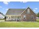 Attractive brick and siding home with a inviting front porch and well-manicured lawn at 441 Garden Ave., Georgetown, SC 29440