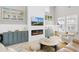 Bright living room with shiplap accent wall, modern fireplace, and stylish decor creates an inviting atmosphere at 441 Garden Ave., Georgetown, SC 29440