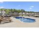 Backyard pool area with plenty of room to relax with lounge chairs and patio furniture at 441 Garden Ave., Georgetown, SC 29440