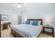 Relaxing bedroom with a queen bed, a desk area, and soft lighting creating a cozy ambiance at 601 Hillside Dr. N # 2305, North Myrtle Beach, SC 29582