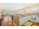 Open kitchen with island, white cabinets and overlooks the dining and living area at 601 Hillside Dr. N # 2305, North Myrtle Beach, SC 29582