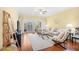 Bright living room featuring hardwood floors, comfortable seating, and sliding doors to a balcony at 601 Hillside Dr. N # 2305, North Myrtle Beach, SC 29582