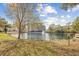 Scenic view of the community pond and building with fountain and landscaping at 601 Hillside Dr. N # 2305, North Myrtle Beach, SC 29582