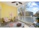 Inviting screened-in porch boasts seating, a ceiling fan and scenic views of the pond at 601 Hillside Dr. N # 2305, North Myrtle Beach, SC 29582