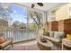 Spacious screened porch offers seating, ceiling fan, and scenic waterfront views at 601 Hillside Dr. N # 2305, North Myrtle Beach, SC 29582